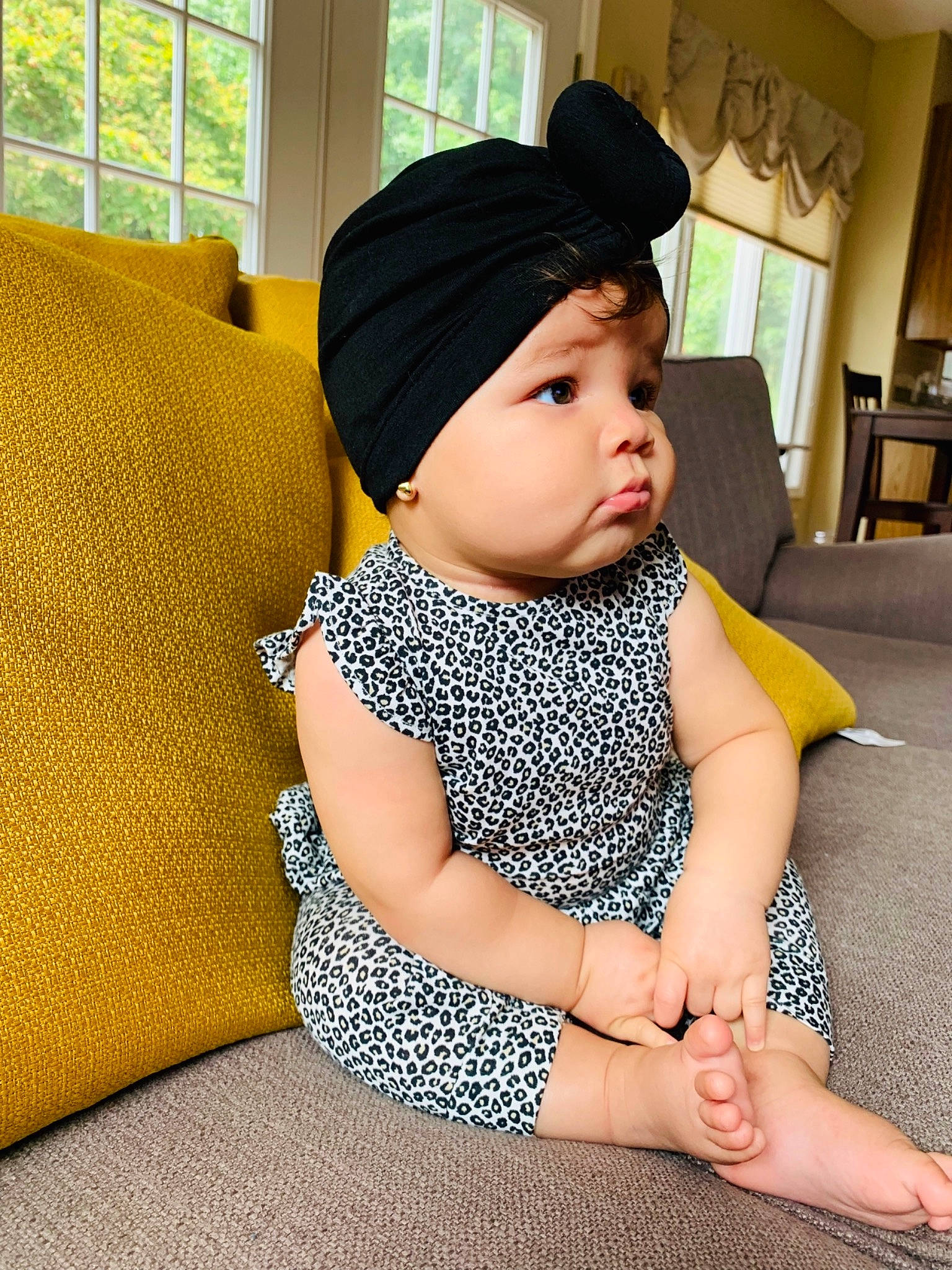 Antonella is registered to the contest to win money with this photo: baby, beanie, beauty, cap, child, clothing, daughter, ear, fashion_accessory, hat, headgear, knit_cap, neck, person, skin, toddler, yellow