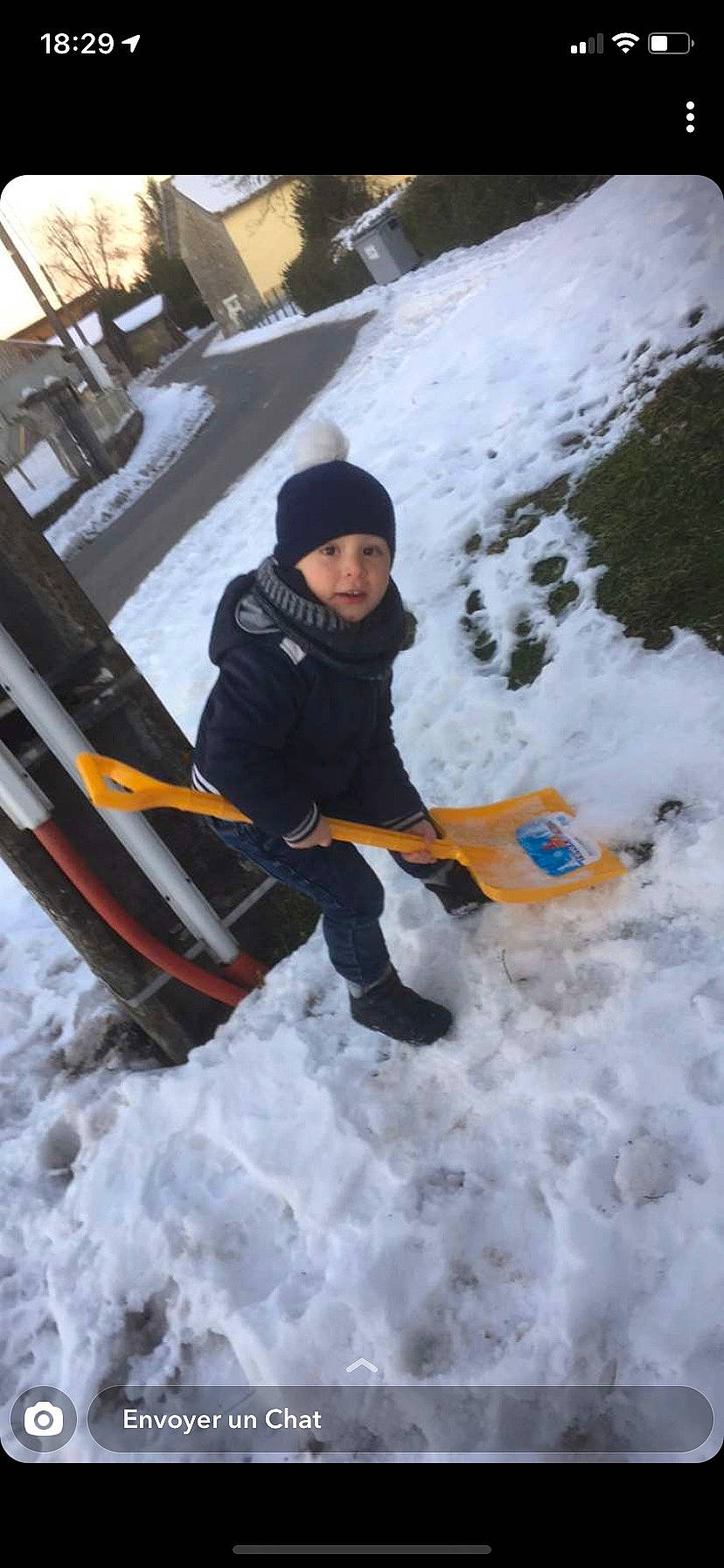 Aaron participe au concours pour gagner de l'argent avec cette photo : adventure, child, event, freezing, fun, headwear, hoodie, jacket, leisure, outdoor_recreation, person, personal_protective_equipment, playing_in_the_snow, precipitation, recreation, shovel, slope, snow, stream, toddler