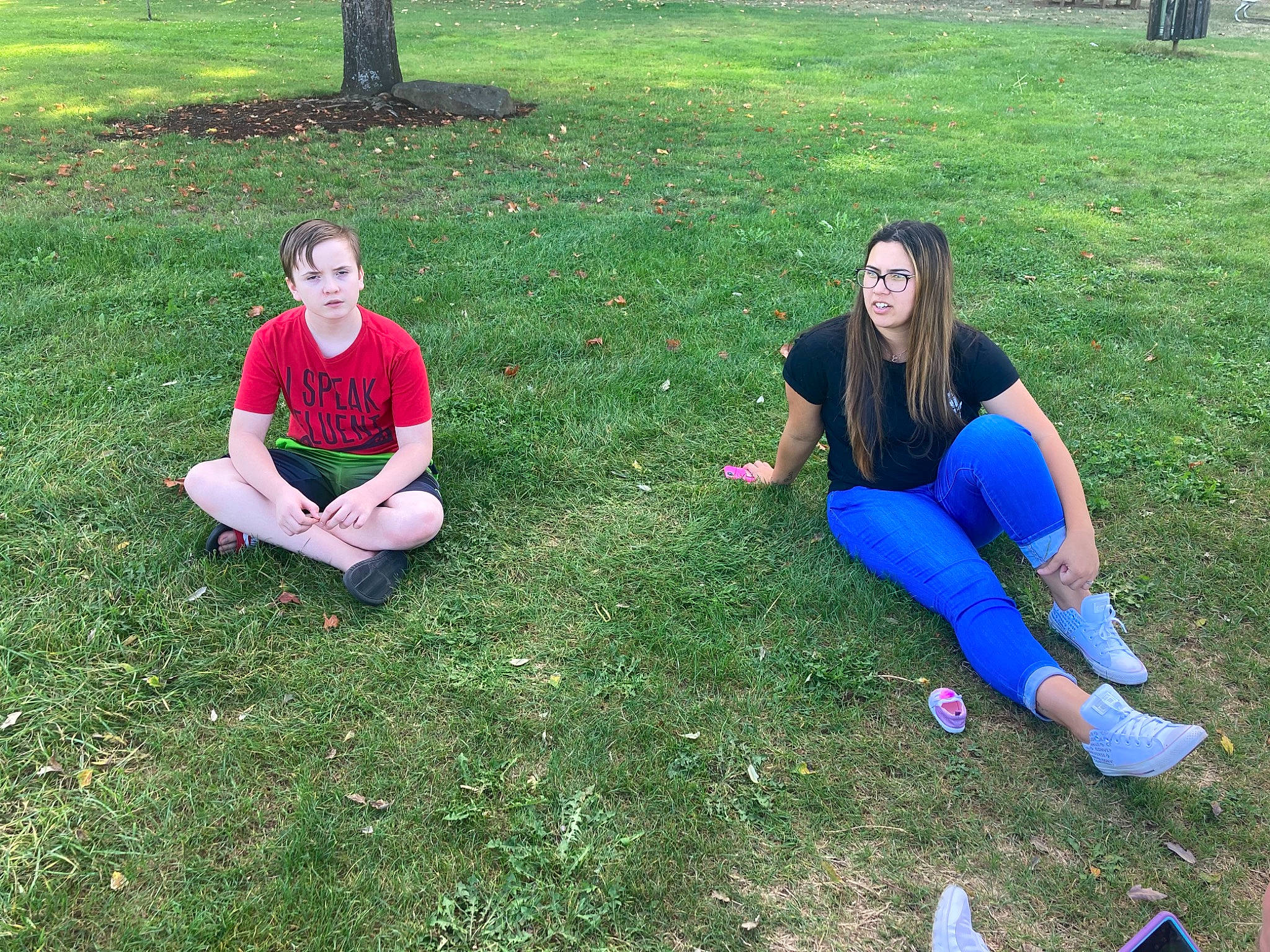 Shawn is registered to the contest to win money with this photo: fun, grass, lawn, leaf, leisure, park, person, physical_fitness, picnic, plant, recreation, sitting, spring, style, summer, team, tree, vacation, youth