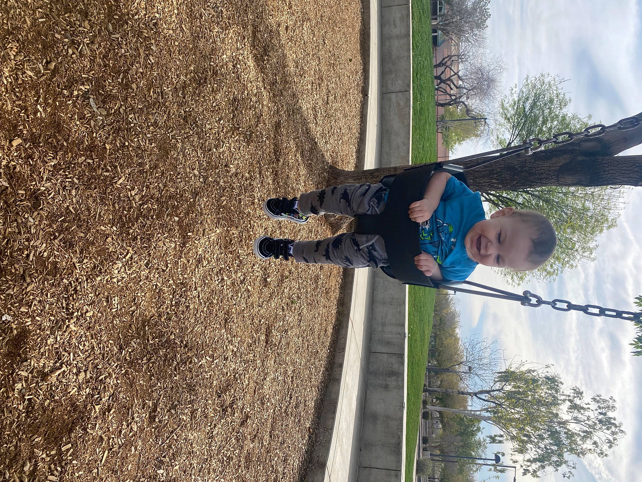 Dezmond is registered to the contest to win money with this photo: child, electric_blue, fun, grass, leisure, people_in_nature, person, plant, recreation, reflection, shadow, sky, soil, tints_and_shades, toddler, tree, vacation, wall