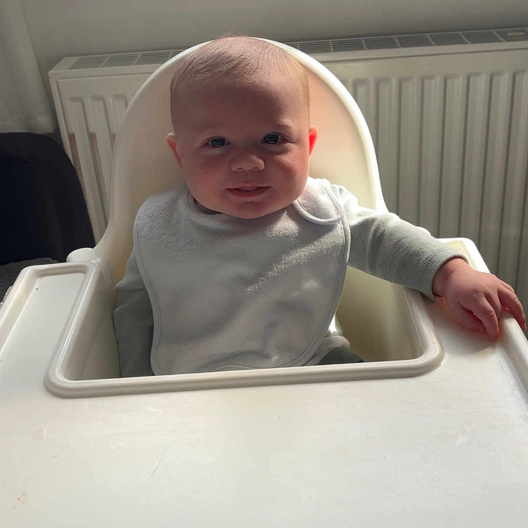 Luca joined the competition — help win amazing prizes! baby, bed, bodypart, chair, crib, cutlery, face, finger, furniture, hand, happy, head, infantbed, person, photography, playarea, portrait, sitting, smile, spoon