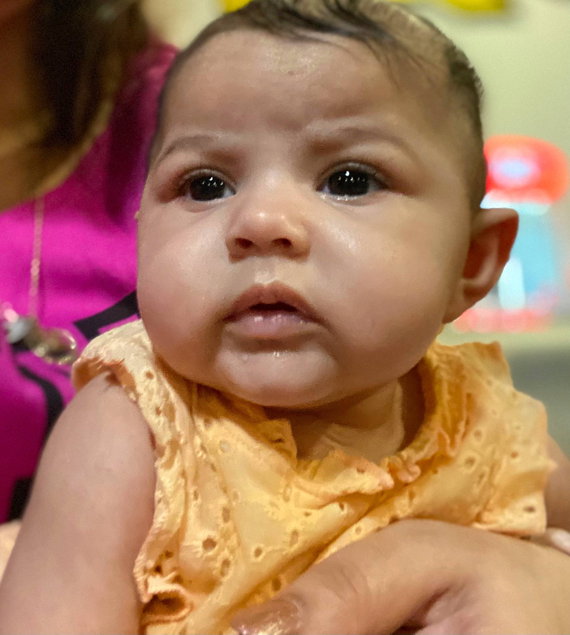 Sofia is registered to the contest to win money with this photo: baby, baby_toddler_clothing, cheek, child, close_up, ear, eyelash, finger, forehead, fun, happy, iris, jaw, lip, mouth, nose, peach, person, skin, sweetness