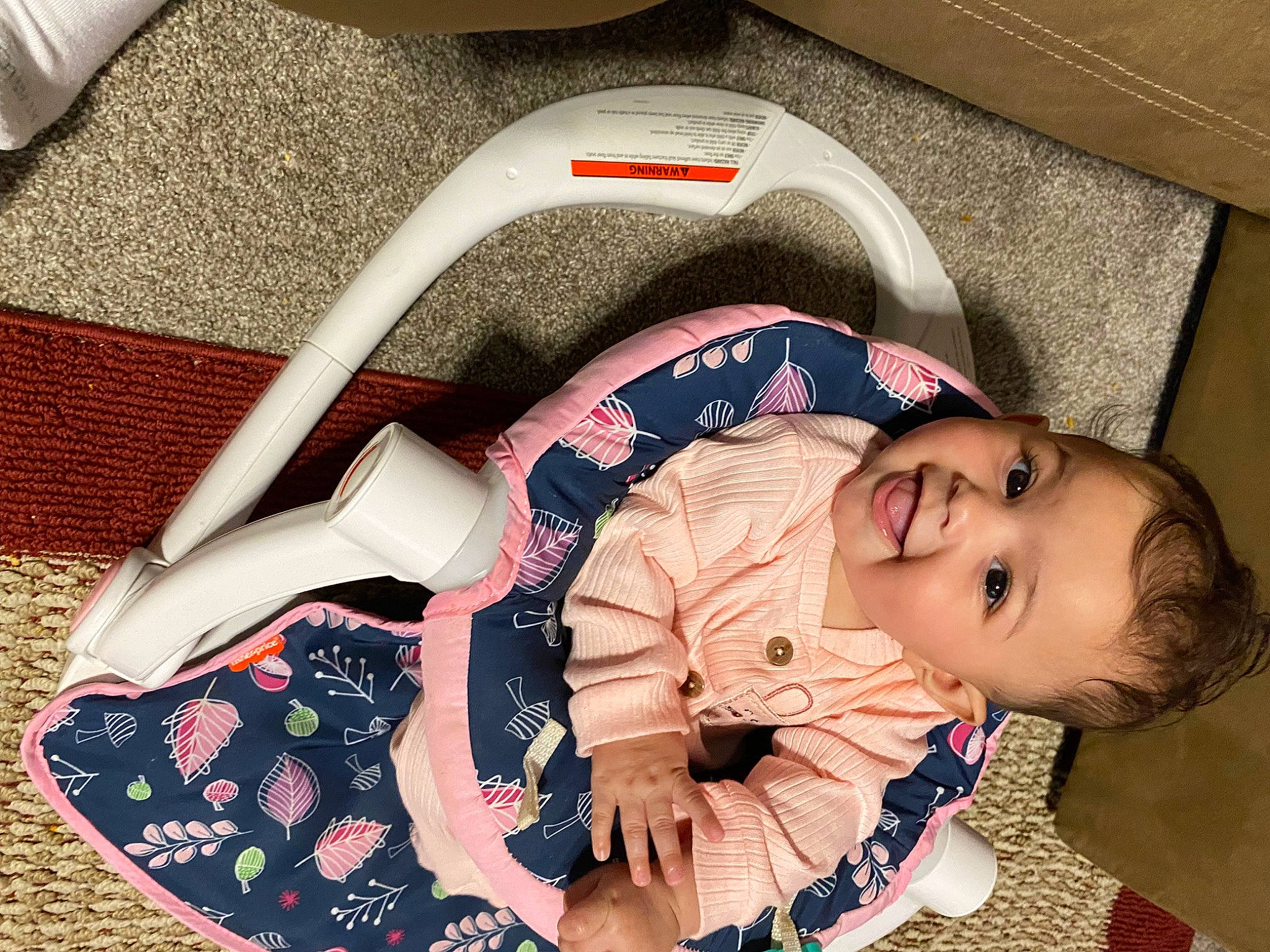 Sofia is registered to the contest to win money with this photo: baby, baby_products, baby_safety, baby_sleeping, baby_toddler_clothing, bag, child, collar, comfort, fashion_accessory, happy, joy, pattern, person, sitting, sleeve, smile, toddler, travel, white