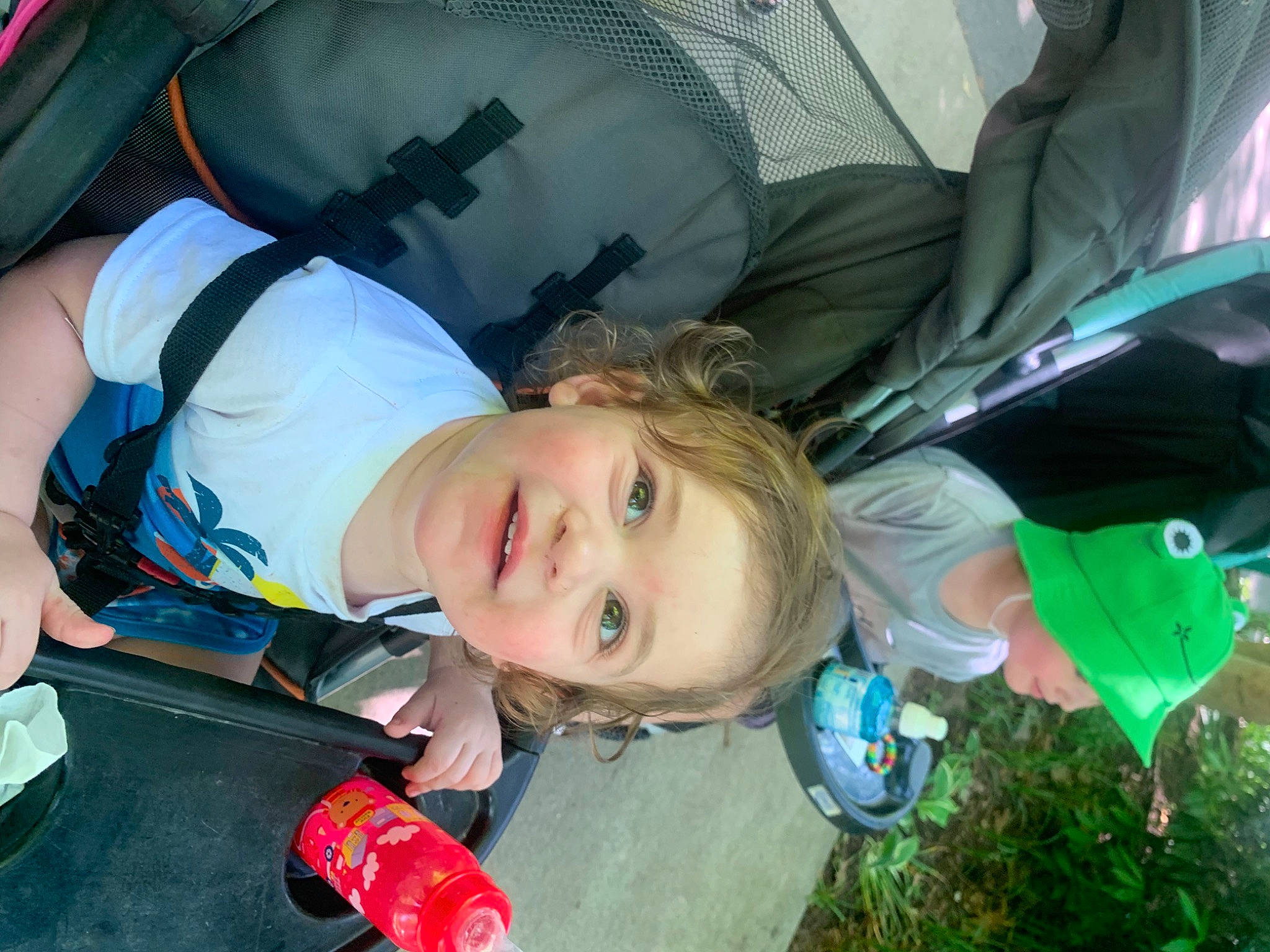 Elliot is registered to the contest to win money with this photo: auto_part, baby_products, child, electric_blue, fun, grass, happy, headwear, joy, leisure, mouth, person, plant, recreation, smile, toddler, travel, tree, vacation