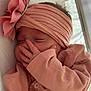 baby, sleeping, headband, flower, pink, blanket, heart_pattern, hand, cozy, infant, child, cute, soft, peaceful, portrait, indoors, closeup, newborn, clothing, resting