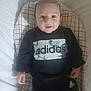 Lowen a rejoint le concours — aidez-le/la à gagner de superbes lots ! baby, infant, child, clothing, black_outfit, adidas, blanket, patterned_blanket, lying_down, smiling, face, head, eyes, hands, indoor, cute, young_child, portrait, happy, casual_wear
