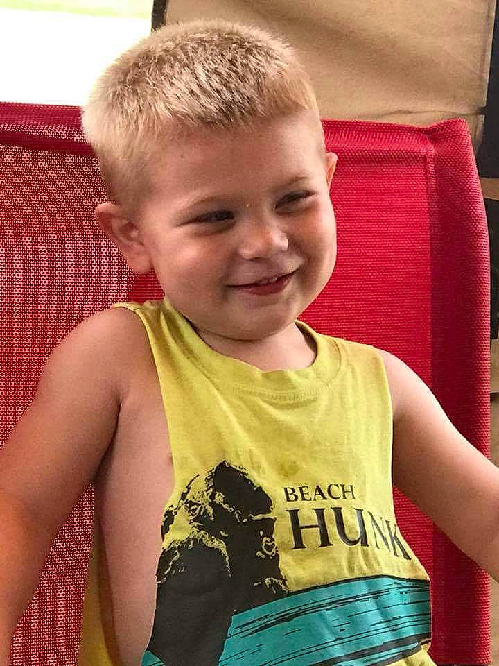 Wyatt is registered to the contest to win money with this photo: arm, blond, child, ear, face, forehead, hair, hairstyle, head, joy, neck, person, skin, smile, t_shirt, toddler