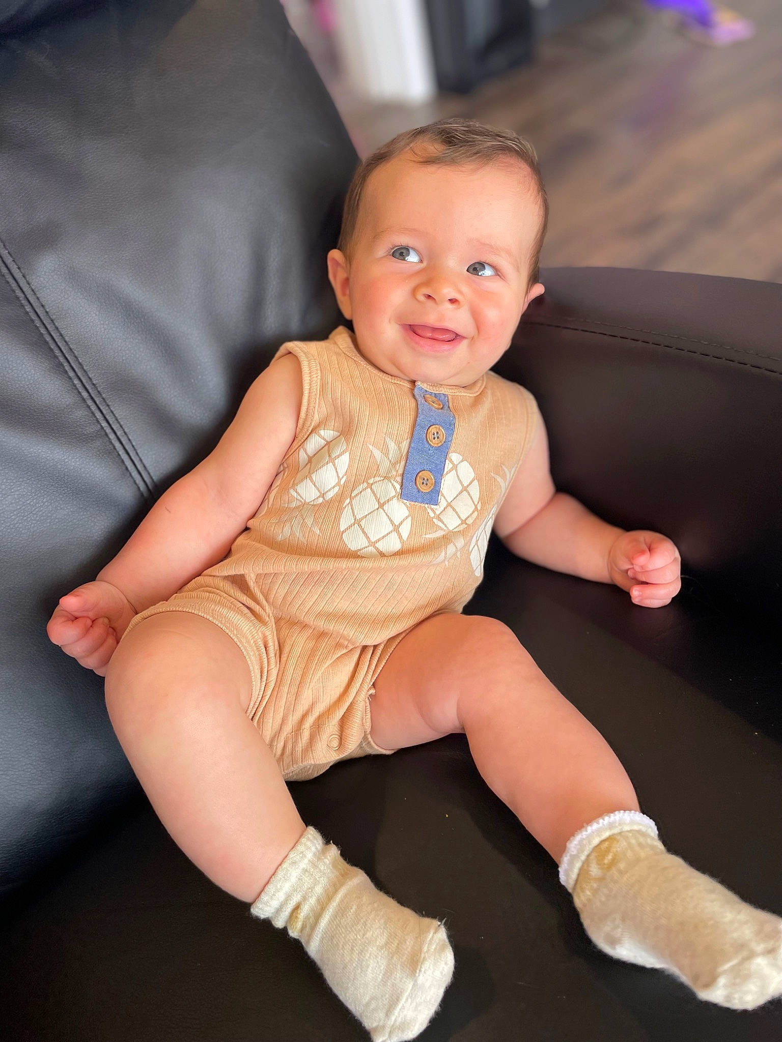 Bryer is registered to the contest to win money with this photo: arm, baby_toddler_clothing, comfort, eye, finger, flash_photography, head, human_body, joint, joy, knee, leg, neck, person, shoulder, skin, sleeve, smile, sock, sportswear