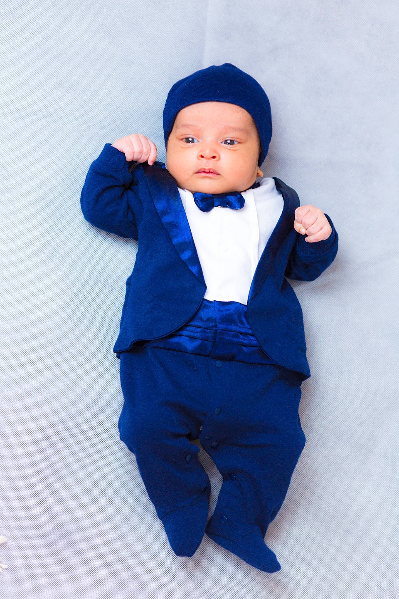 Akira is registered to the contest to win money with this photo: baby, baby_toddler_clothing, cap, collar, denim, electric_blue, eye, face, fashion_accessory, flash_photography, formal_wear, gesture, happy, head, headwear, jacket, magenta, outerwear, person, sleeve