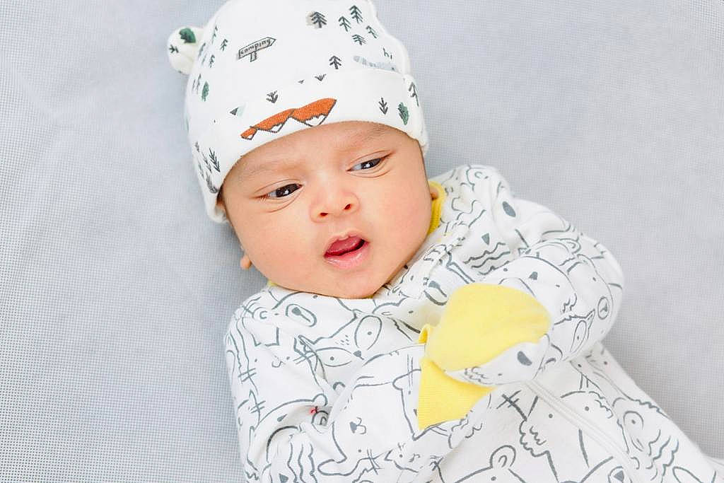 Akira is registered to the contest to win money with this photo: baby, baby_toddler_clothing, beanie, cap, cheek, child, comfort, face, fashion_accessory, flash_photography, happy, headgear, headwear, knit_cap, lip, pattern, person, portrait_photography, sleeve, smile