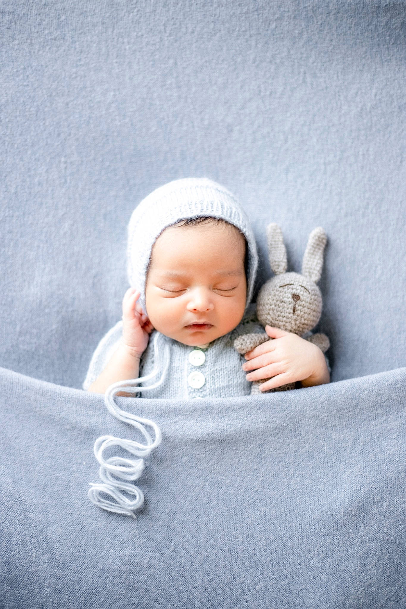 Akira joined the competition — help win amazing prizes! baby, baby_sleeping, baby_toddler_clothing, cap, child, comfort, flash_photography, fur, gesture, grass, grey, happy, headwear, human_body, knit_cap, linens, monochrome_photography, person, sitting, skin