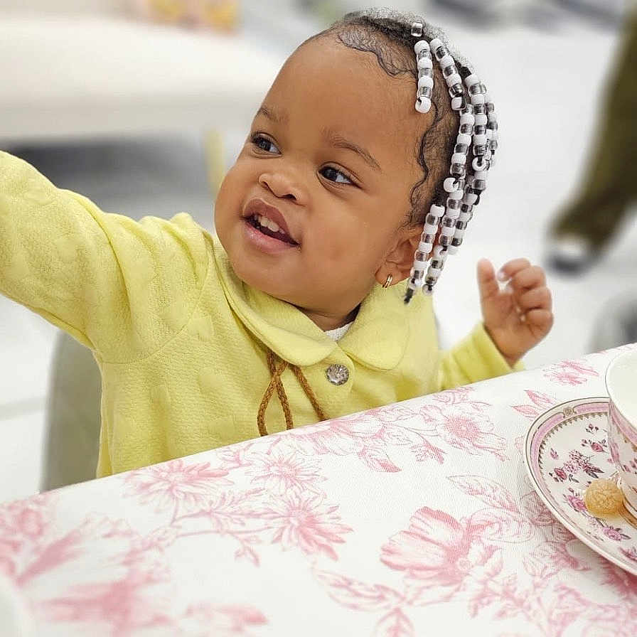Zhané joined the competition — help win amazing prizes! architecture, baby, bodypart, building, cutlery, diningroom, diningtable, face, finger, furniture, hand, happy, head, indoors, person, photography, portrait, room, spoon, table