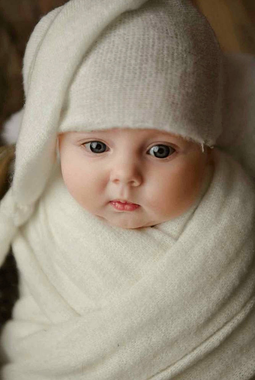 Everly joined the competition — help win amazing prizes! baby, baby_toddler_clothing, beanie, cap, cheek, child, collar, comfort, eyebrow, face, fashion_accessory, flash_photography, fur, hat, headwear, knit_cap, lip, person, sleeve, toddler