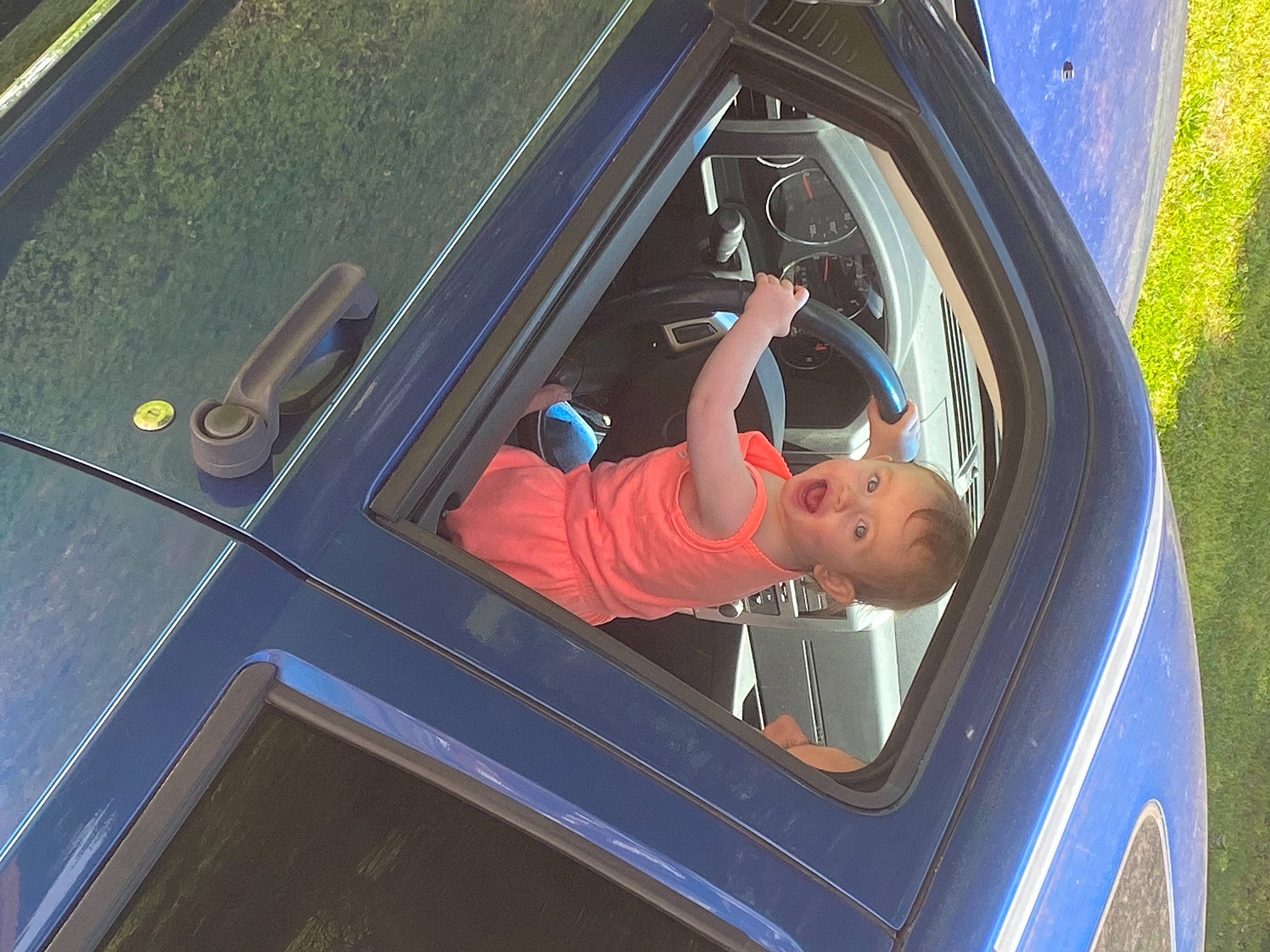 Lakelyn is registered to the contest to win money with this photo: auto_part, automotive_design, automotive_exterior, automotive_lighting, automotive_tire, automotive_wheel_system, automotive_window_part, electric_blue, fixture, fun, glass, hood, leisure, mode_of_transport, motor_vehicle, person, tints_and_shades, vehicle, vehicle_door, window