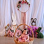Mia joined the competition — help win amazing prizes! baby, basket, pink_dress, flowers, floral_arrangement, bunny_decor, wicker, child, indoor, portrait, cute, props, decorations, floor, smiling, person, white_curtain, spring, celebration, festive