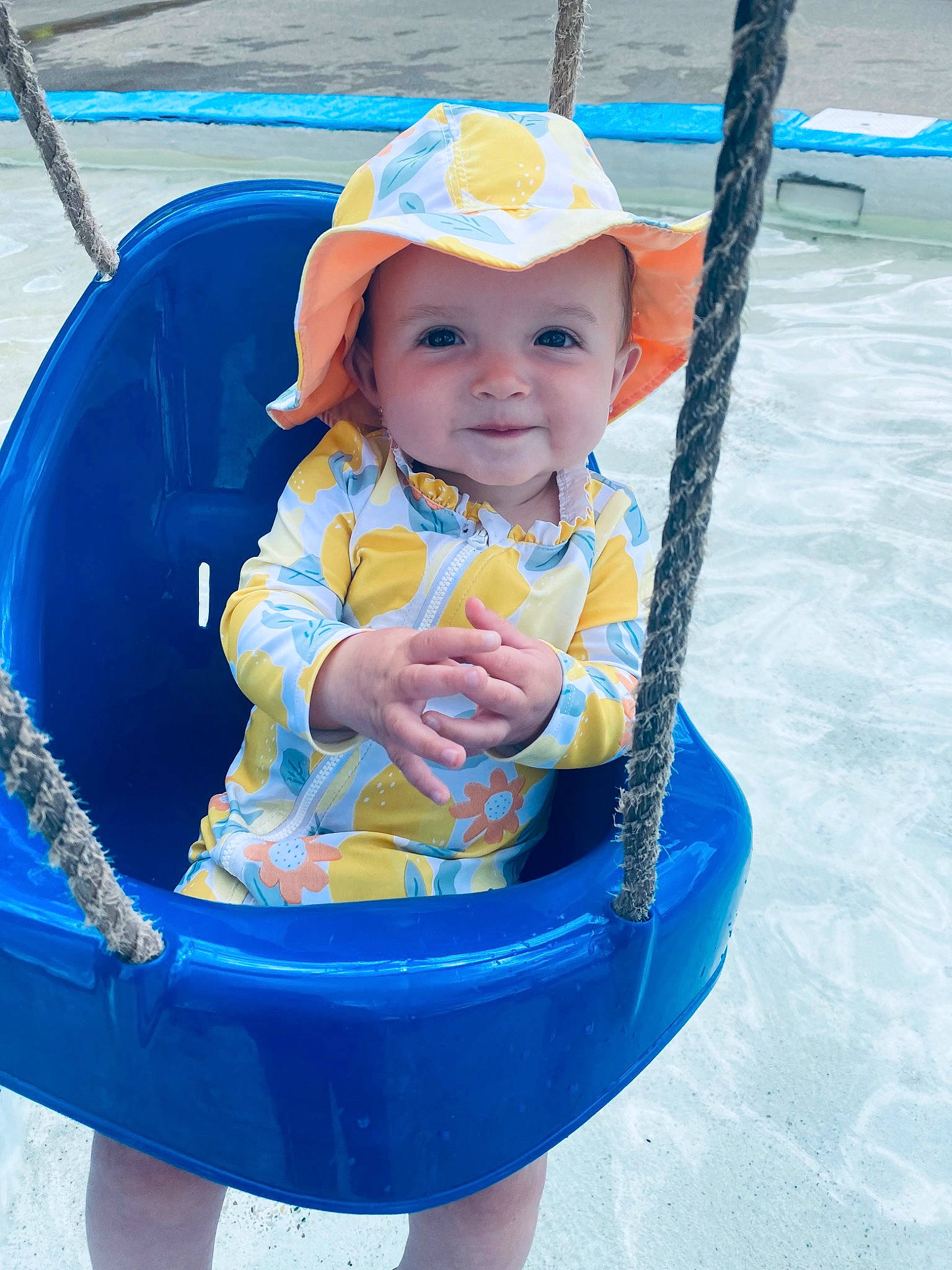 Charlotte is registered to the contest to win money with this photo: azure, baby, baby_toddler_clothing, blue, cap, child, electric_blue, fun, happy, hat, headwear, joy, leisure, outdoor_recreation, person, product, recreation, smile, summer, toddler
