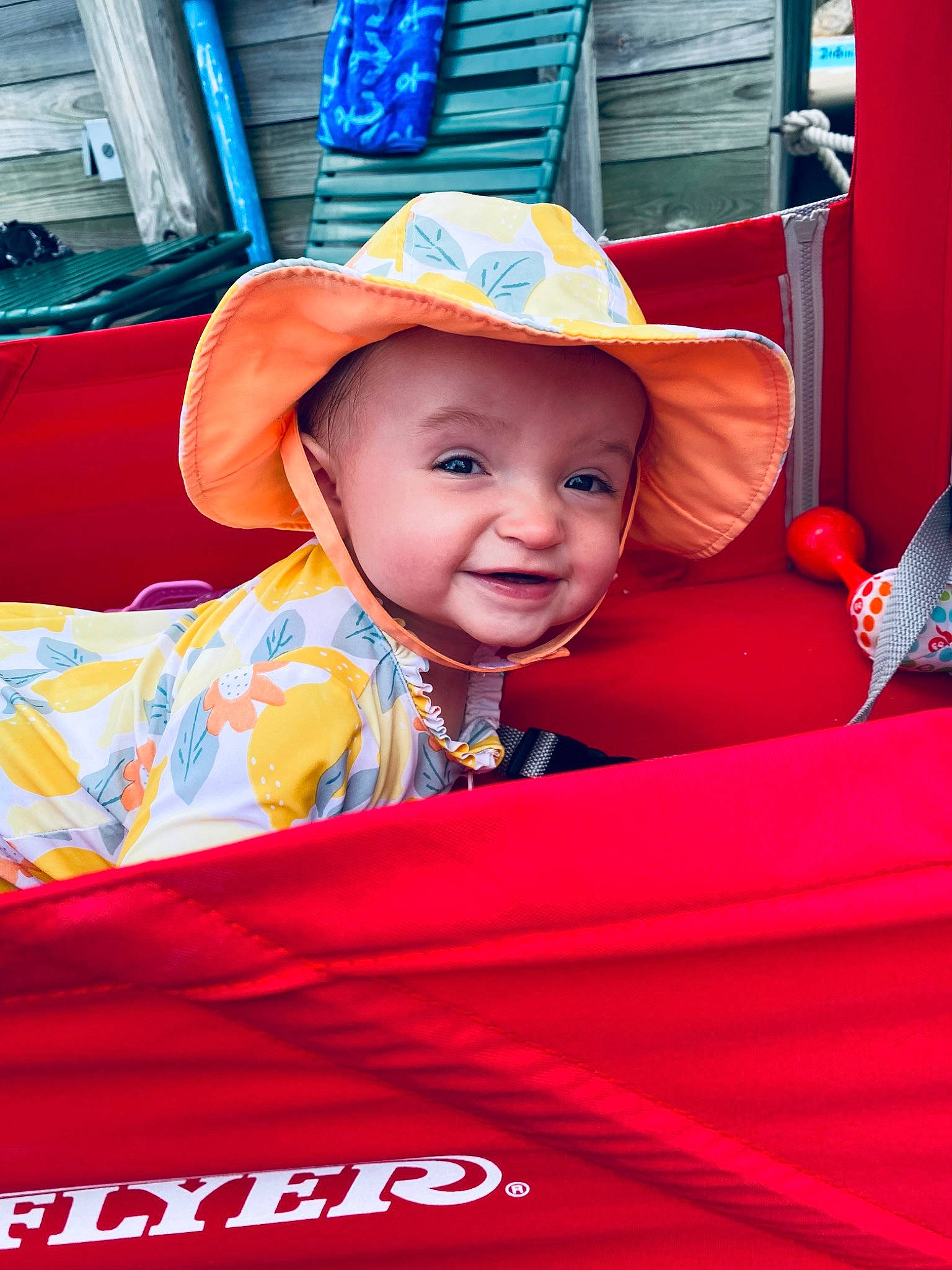 Charlotte is registered to the contest to win money with this photo: baby, baby_toddler_clothing, blue, cap, electric_blue, event, fun, happy, hat, headgear, headwear, leisure, magenta, person, pink, product, red, smile, sun_hat, textile