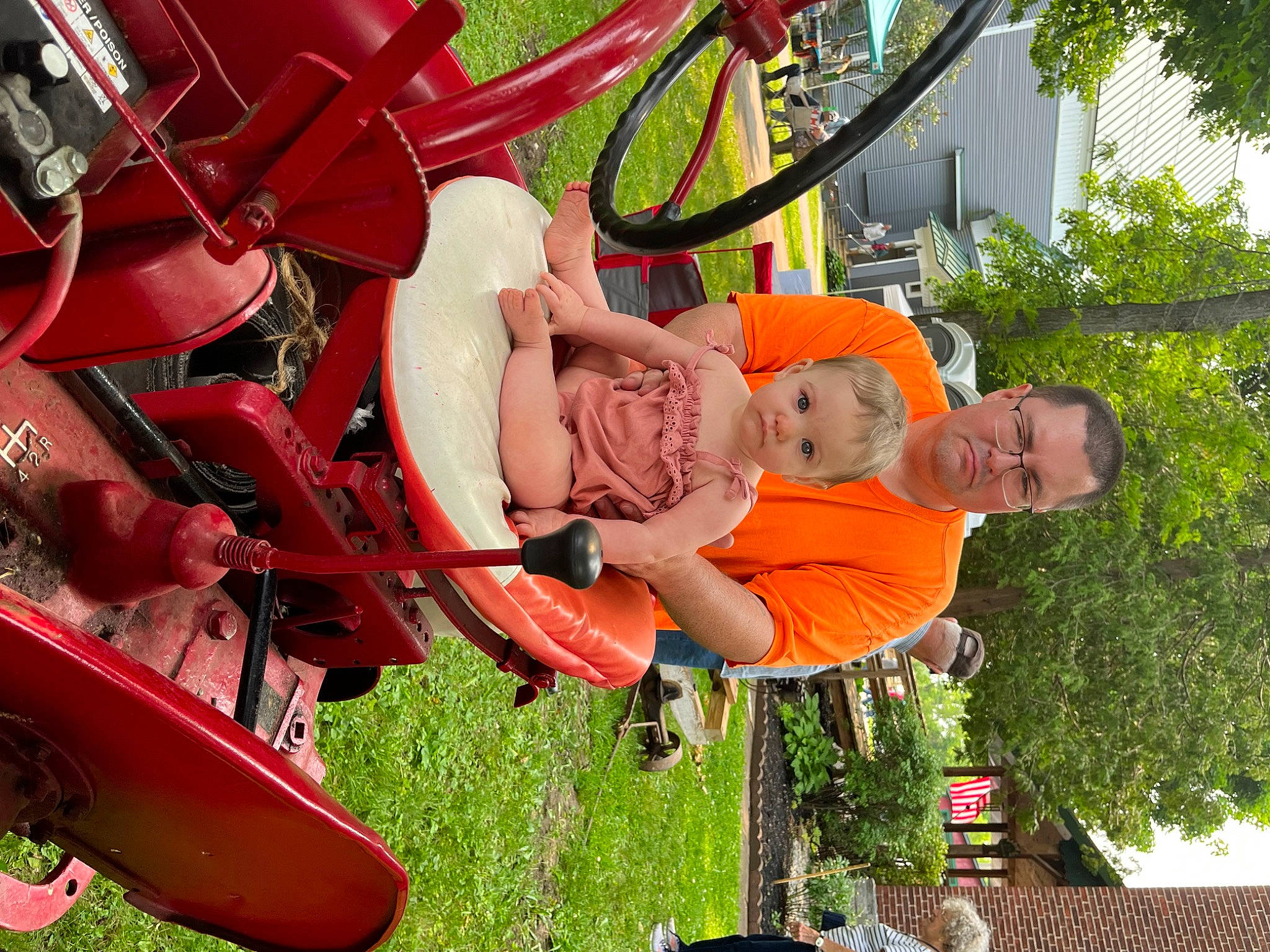 Savannah joined the competition — help win amazing prizes! amusement_ride, automotive_wheel_system, baby, child, city, fun, garden, grass, green, leisure, motor_vehicle, outdoor_play_equipment, person, plant, play, recreation, tire, toddler, tree, wheel