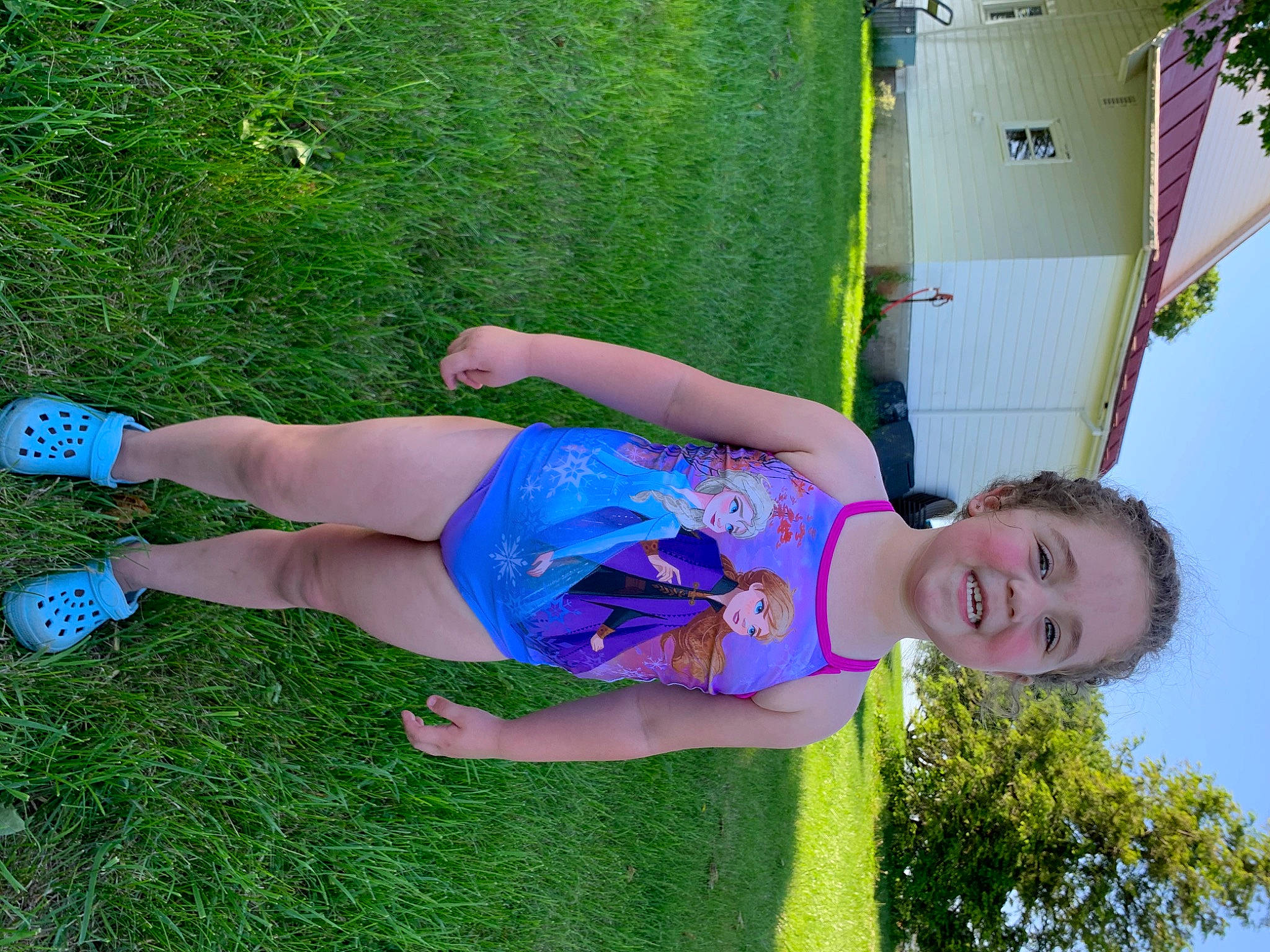 Elizabeth is registered to the contest to win money with this photo: blue, child, electric_blue, fun, grass, joy, leg, person, plant, summer, vacation