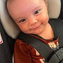Jackson is registered to the contest to win money with this photo: baby, smiling, car_seat, pacifier, child, infant, seatbelt, clothing, cute, closeup, young_child, happiness, safety, indoors, headrest, person, portrait, baby_girl, baby_boy, seat