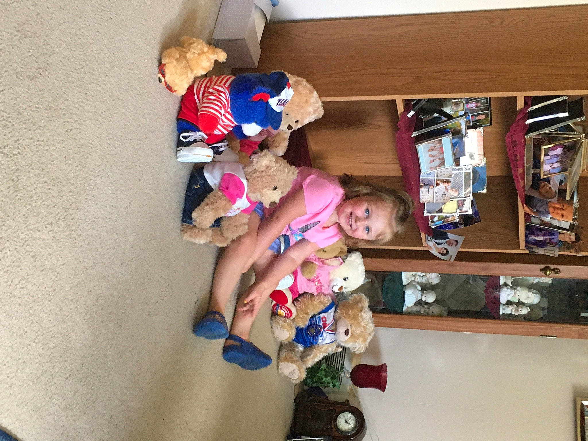 Sofina is registered to the contest to win money with this photo: blurred, child, fun, joy, person, play, room, shelf, shelving, stuffed_toy, toddler, toy