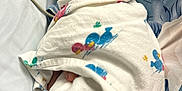 Jeremiah joined the competition — help win amazing prizes! newborn, baby, hospital, blanket, duck_print, crib, nasal_tube, smile, swaddled, infant, bed, medical, cute, peaceful, person, portrait, healthcare, resting, child, indoors