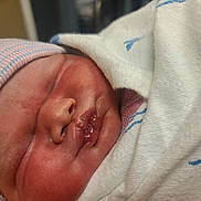 Jeremiah joined the competition — help win amazing prizes! newborn, baby, sleeping, infant, closeup, face, blanket, hat, swaddled, peaceful, soft, skin, cute, wrapped, child, newborn_hat, indoors, tiny, mouth, closed_eyes