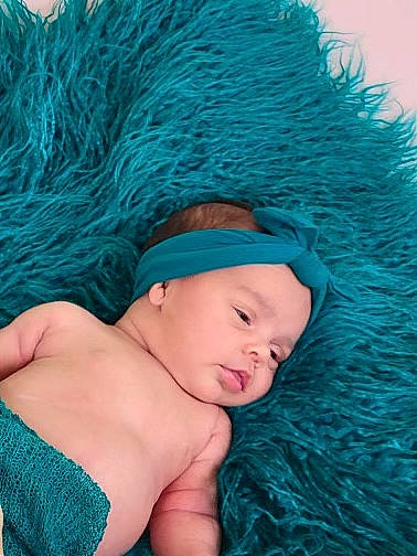 Alora joined the competition — help win amazing prizes! aqua, azure, baby, beanie, blue, cap, electric_blue, fashion_accessory, fur, grass, green, hat, headgear, headwear, knit_cap, linens, magenta, pattern, person, textile