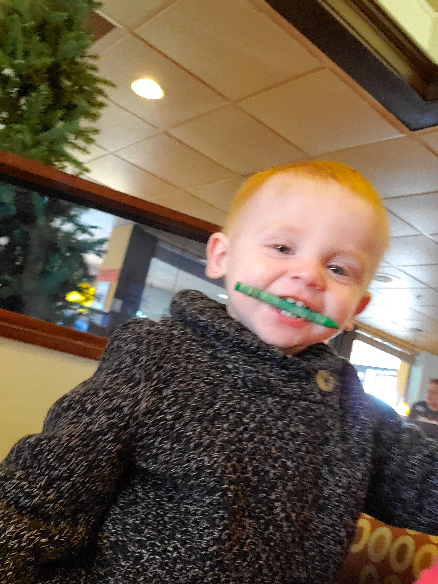 Brandon is registered to the contest to win money with this photo: baby, cheek, child, face, hair, head, outerwear, person, smile, toddler