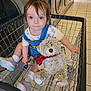 Faith is registered to the contest to win money with this photo: toddler, child, shopping_cart, laundromat, teddy_bear, toy, blue_eyes, hair_clip, denim_overalls, sneakers, white_socks, floor_tiles, washing_machines, metal_cart, indoor, cute, playful, portrait, seated, looking_up