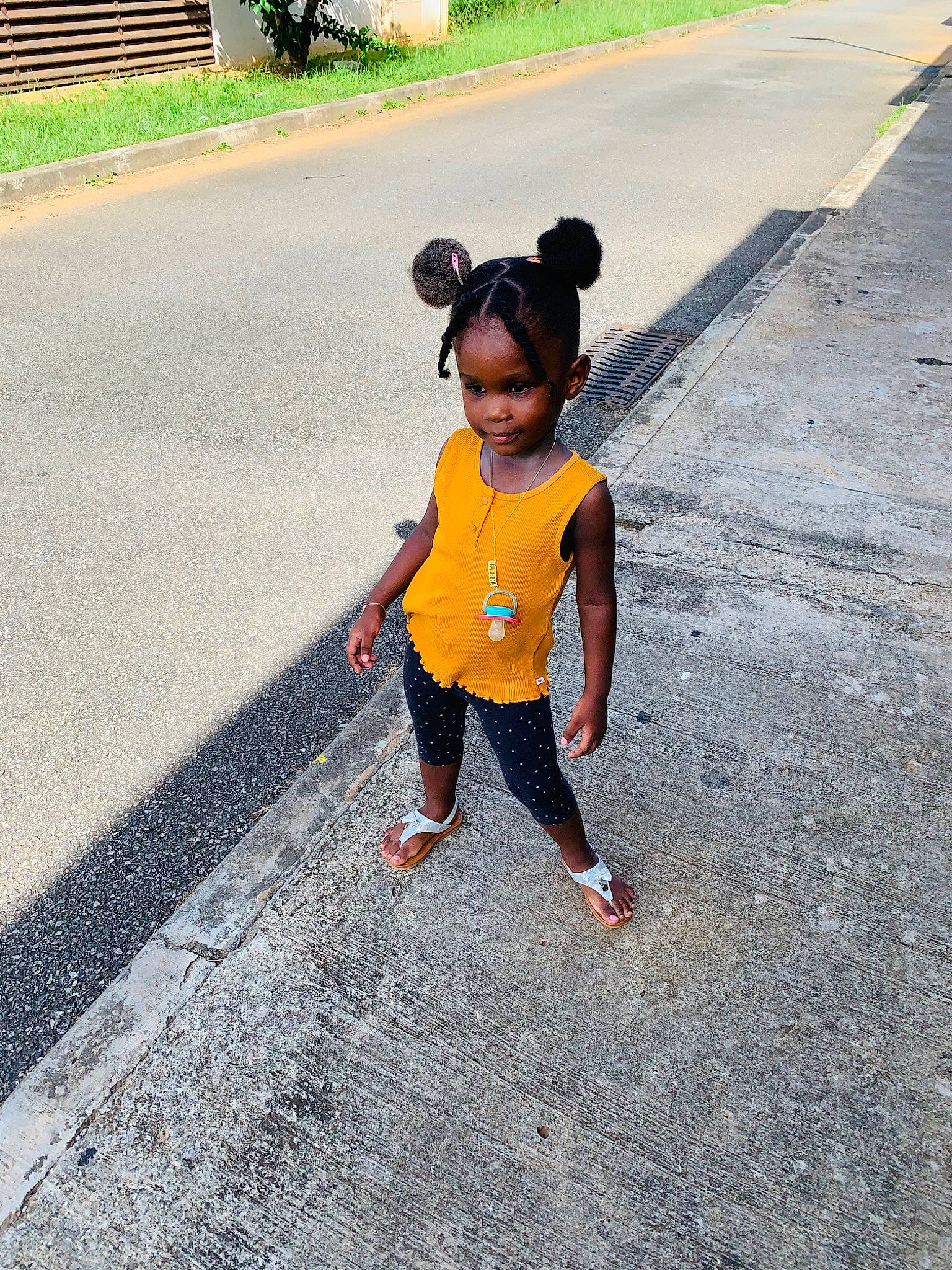 Olyana participe au concours pour gagner de l'argent avec cette photo : asphalt, baby, baby_toddler_clothing, eye, grass, hair, happy, leisure, pedestrian, person, plant, recreation, road, road_surface, sidewalk, sleeve, t_shirt, tar, toddler, tree