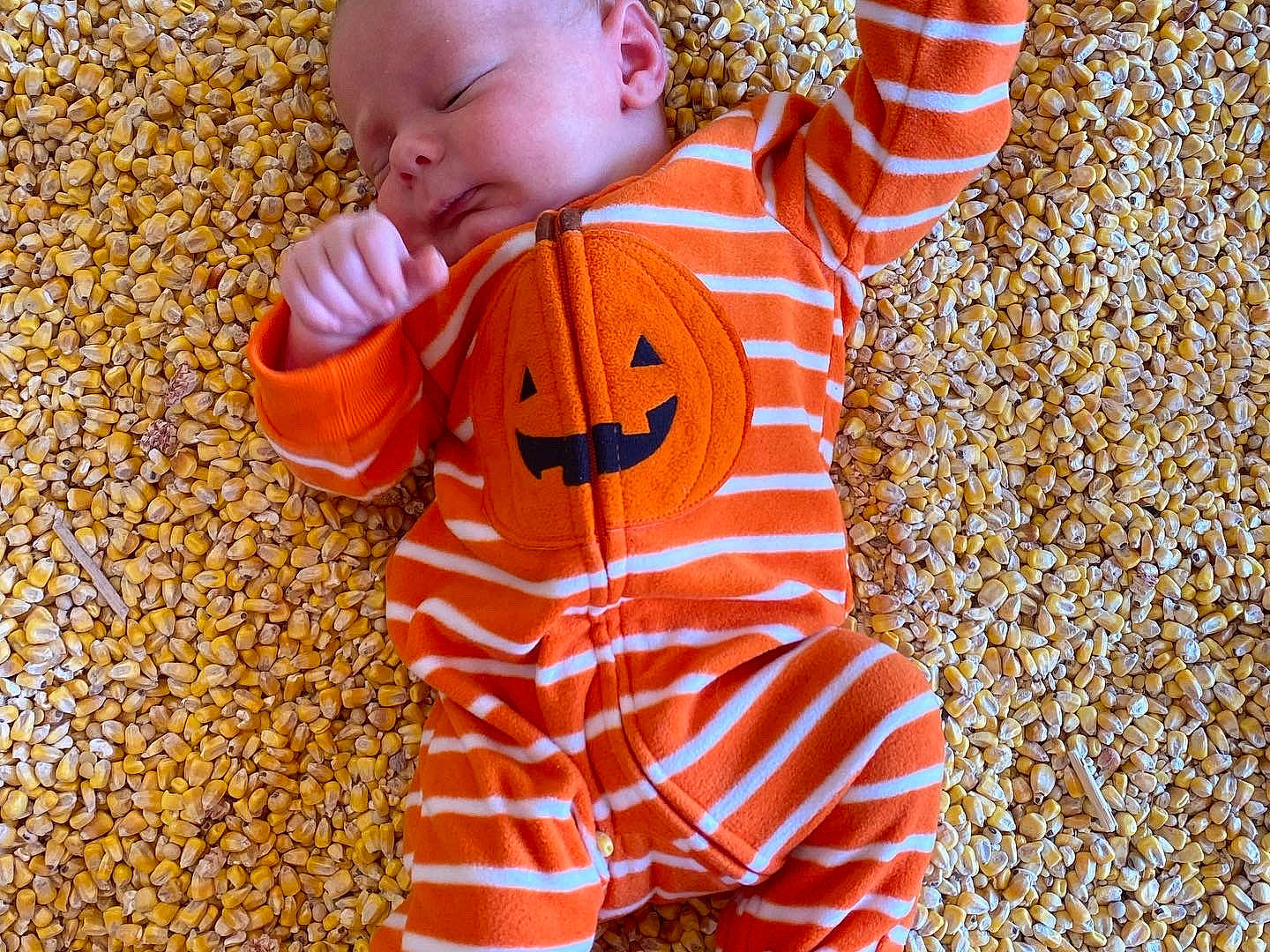 Cass is registered to the contest to win money with this photo: baby, baby_products, baby_toddler_clothing, baby_toys, child, electric_blue, font, fun, happy, nightwear, orange, pattern, peach, people_in_nature, person, play, sleeve, toddler