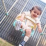 Zelko a rejoint le concours — aidez-le/la à gagner de superbes lots ! baby, child, clothing, daylight, fence, footwear, fun, grass, happy, metal, outdoor, person, playground, seat, shoe, smiling, sock, swing, toddler, toy