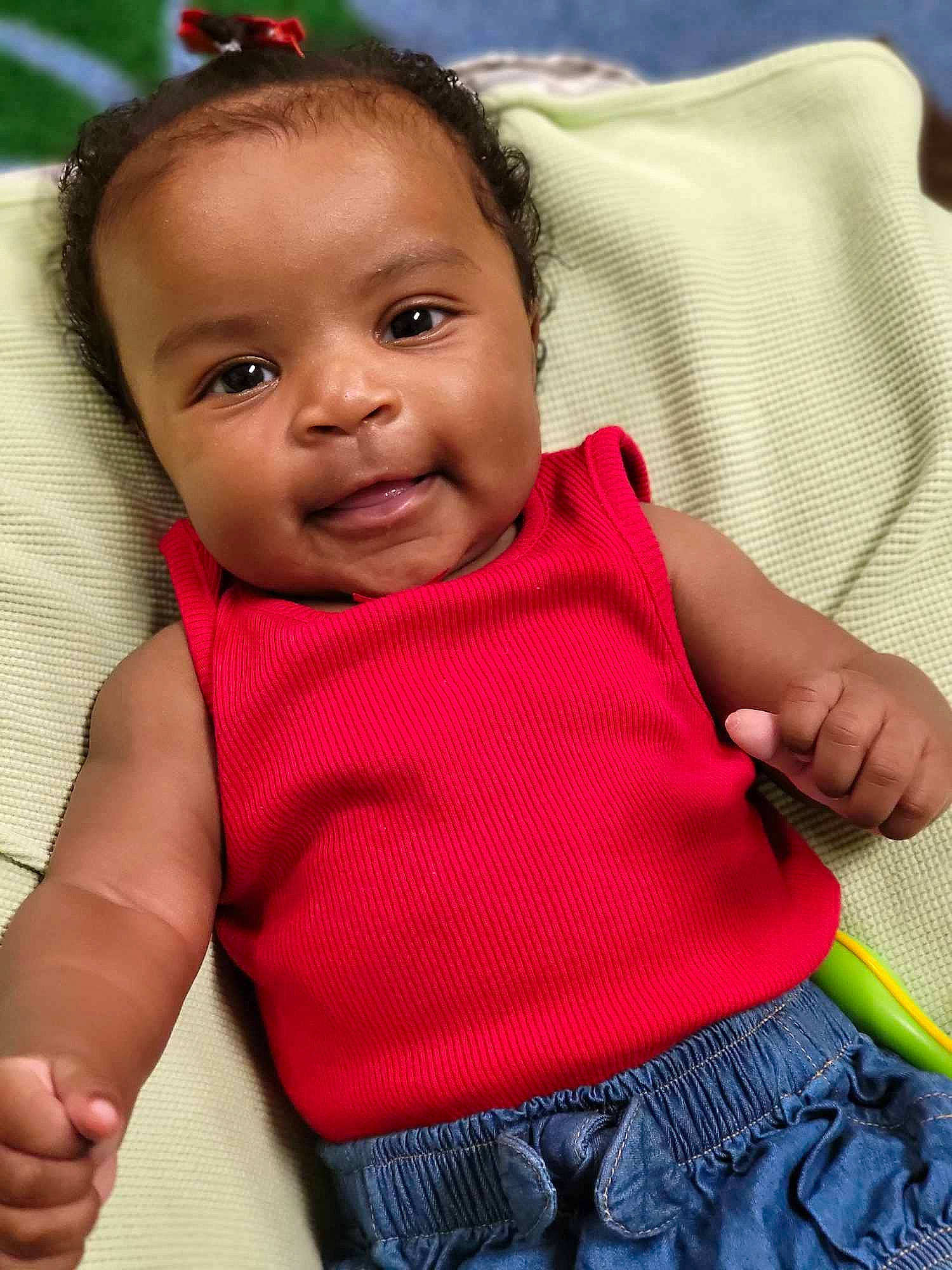 Kenslee Marie is registered to the contest to win money with this photo: baby_toddler_clothing, cheek, chin, eye, eyebrow, face, facial_expression, hair, hairstyle, head, human_body, lip, mouth, neck, nose, organ, person, skin, sleeve, smile