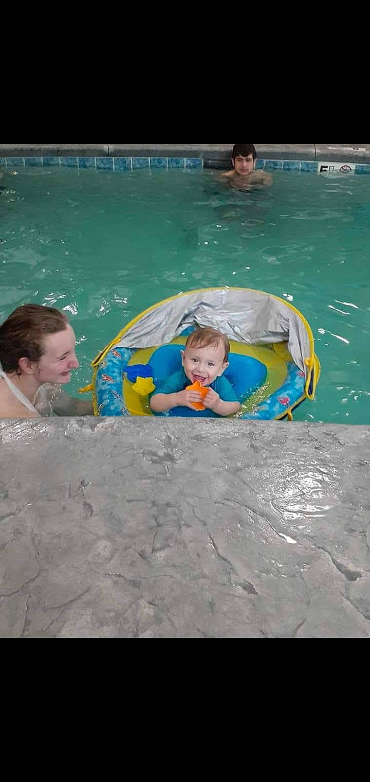 Brycen is registered to the contest to win money with this photo: aqua, azure, bathing, body_of_water, child, fun, games, happy, joy, leisure, leisure_centre, mammal, person, personal_protective_equipment, product, recreation, smile, summer, swimming_pool, toddler