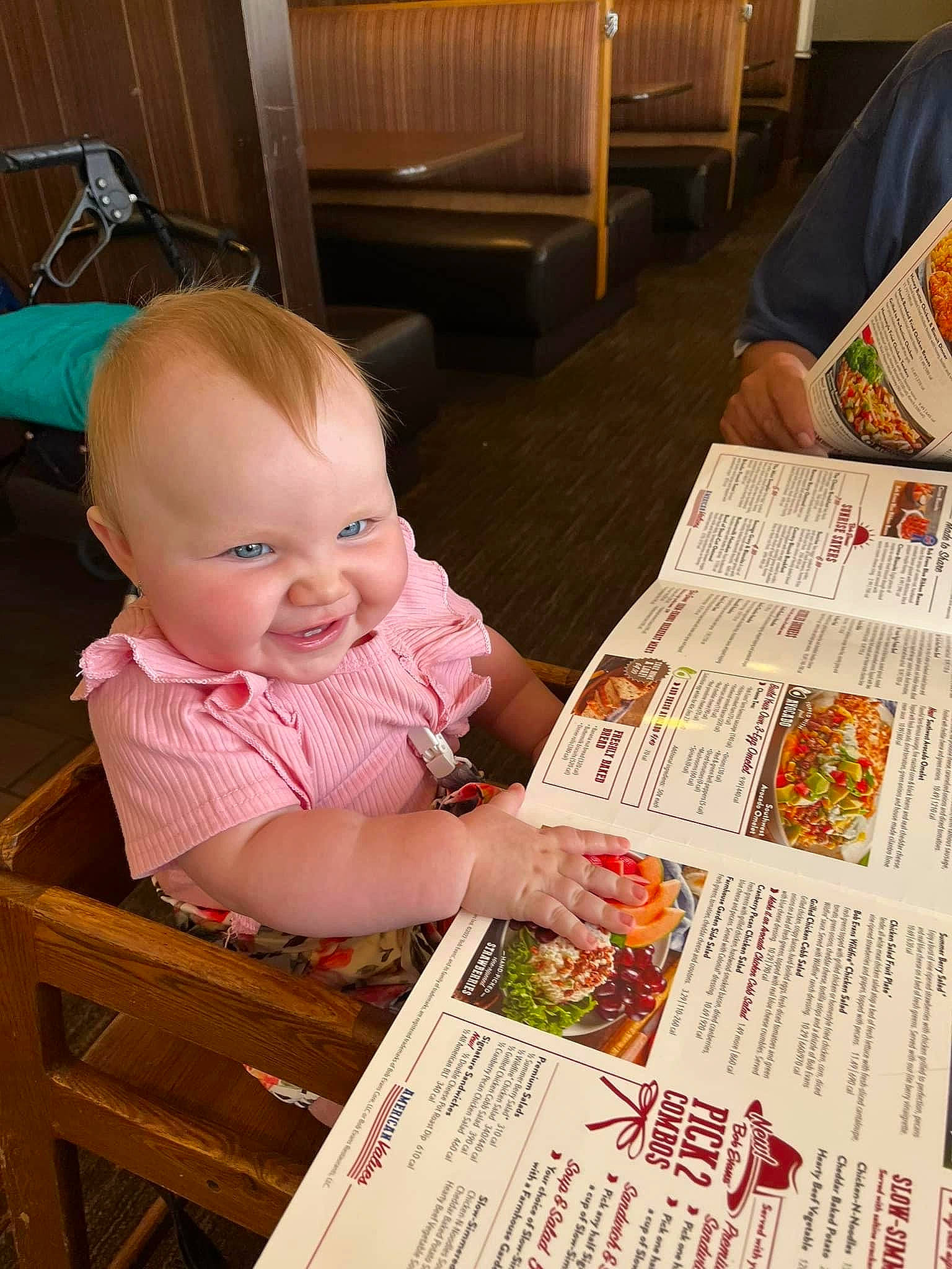 Dahlia is registered to the contest to win money with this photo: baby, baby_toddler_clothing, beauty, chair, child, comfort, flooring, fun, hand, lap, news, newspaper, paper, person, publication, room, sitting, smile, snapshot, toddler