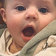 Joy participe au concours pour gagner de l'argent avec cette photo : baby, face, eyes, mouth, expression, towel, clothing, closeup, surprise, child, infant, skin, eyelashes, head, portrait, cute, soft, person, newborn, warm