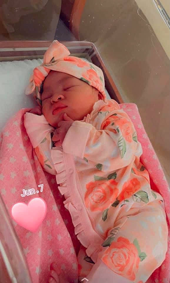 Kaelyn is registered to the contest to win money with this photo: baby, baby_products, baby_safety, baby_sleeping, baby_toddler_clothing, bedtime, child, comfort, event, headwear, infant_bed, linens, magenta, mouth, pattern, peach, person, pink, product, room