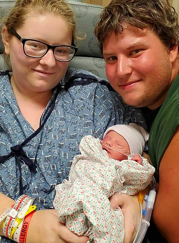 Willow is registered to the contest to win money with this photo: baby, birth, child, childbirth, daughter, family, father, grandparent, joy, mother, people, person, toddler