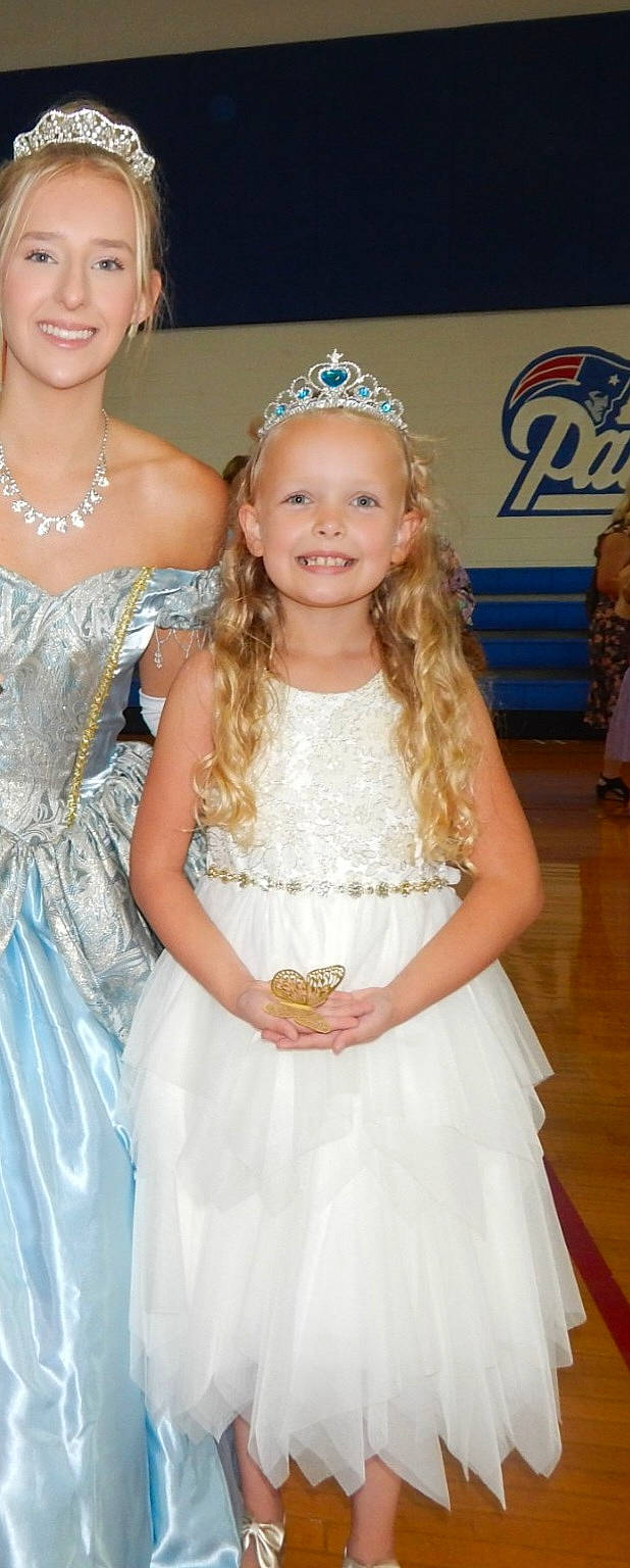 Marilyn is registered to the contest to win money with this photo: bridal_accessory, bridal_clothing, dress, facial_expression, fashion, fashion_design, fun, gown, hair, hairstyle, happy, headgear, headpiece, joy, person, photograph, pink, skin, smile, standing