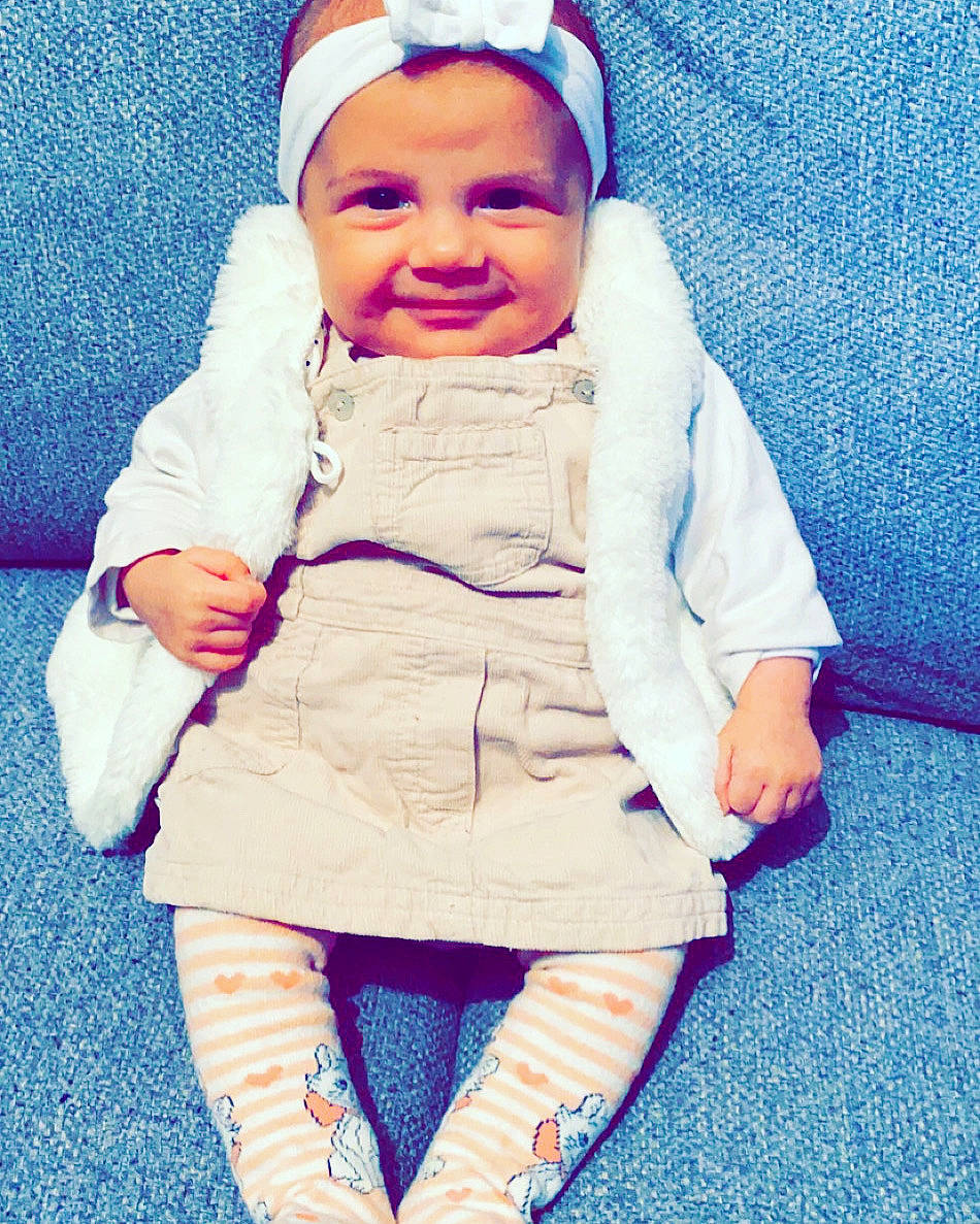 Mélody a rejoint le concours — aidez-le/la à gagner de superbes lots ! baby, cheek, child, cool, face, head, headgear, headwear, jacket, joy, outerwear, person, pink, product, purple, shoe, skin, smile, toddler