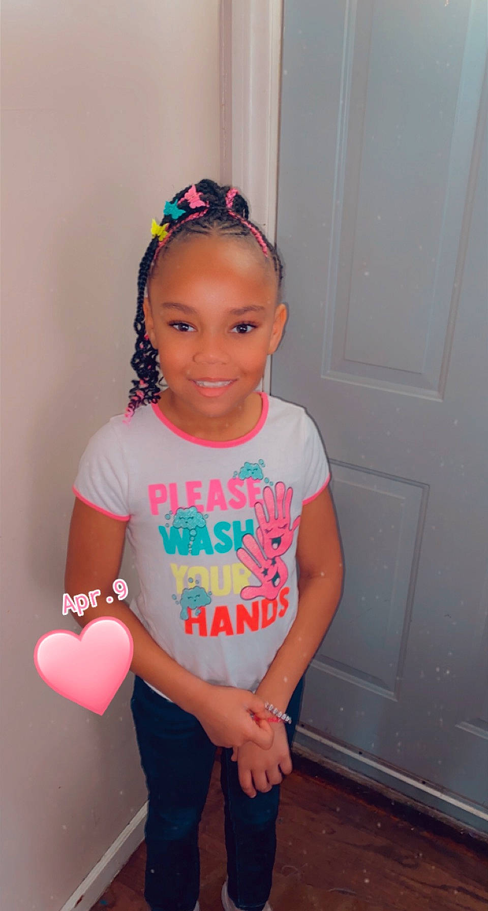 Imani is registered to the contest to win money with this photo: arm, baby_toddler_clothing, balloon, child, clothing, door, electric_blue, fun, hair, happy, headband, joy, magenta, neck, party_supply, person, pink, sleeve, smile, t_shirt