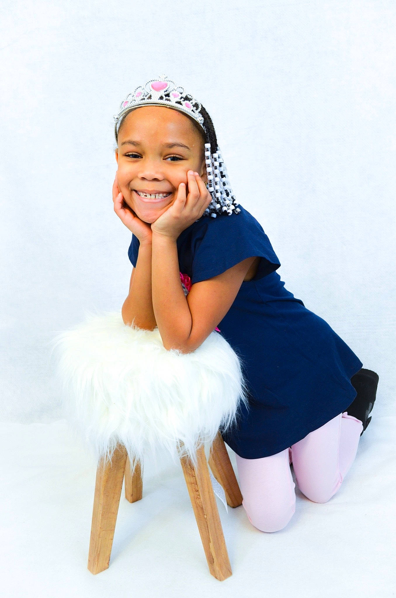 Imani joined the competition — help win amazing prizes! baby_toddler_clothing, dress, electric_blue, event, fashion_accessory, fashion_design, flash_photography, fur, hair, hair_accessory, happy, headband, headpiece, headwear, human_leg, joy, person, sitting, sleeve, smile