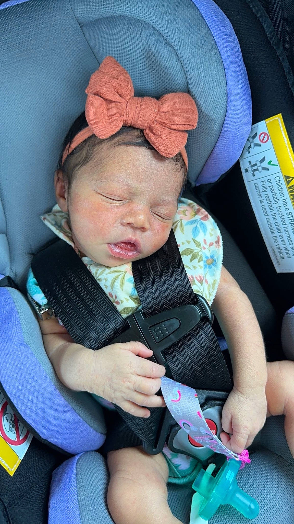 Tenylah is registered to the contest to win money with this photo: auto_part, baby, baby_carriage, baby_in_car_seat, baby_products, baby_toddler_clothing, car_seat, cheek, child, comfort, finger, hand, lap, nail, person, product, seat_belt, sitting, skin, thumb