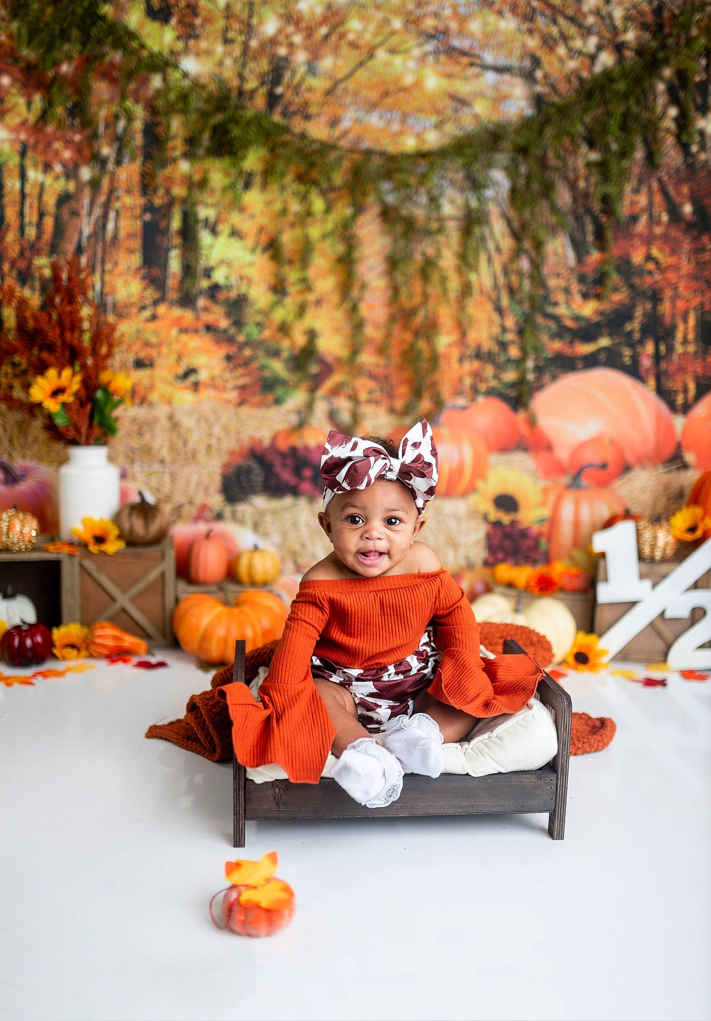 Tenylah is registered to the contest to win money with this photo: calabaza, child, cucurbita, event, fun, gourd, grass, headwear, jack_o_lantern, leisure, musical_instrument, orange, person, plant, pumpkin, recreation, toddler, tradition, tree, trick_or_treat