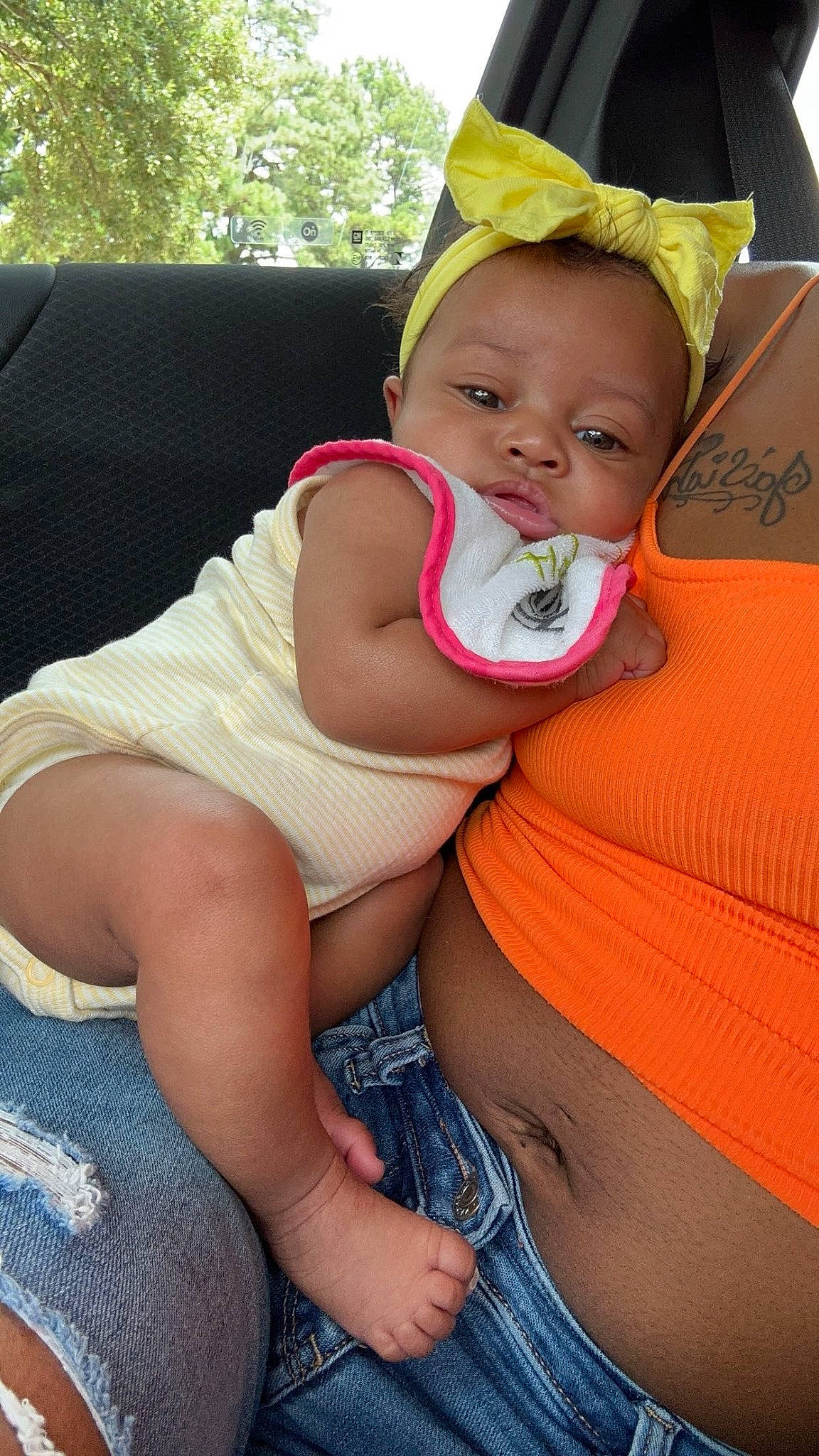 Tenylah is registered to the contest to win money with this photo: baby, baby_toddler_clothing, child, comfort, eye, face, facial_expression, grass, happy, head, human_body, knee, leg, mouth, person, pink, skin, stomach, summer, thigh