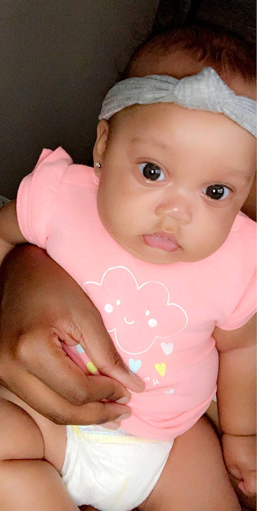 Stori joined the competition — help win amazing prizes! baby, cheek, child, close_up, face, finger, hand, lip, mouth, neck, nose, person, pink, skin, stomach, toddler