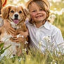 child, dog, smiling, hat, wildflowers, grass, outdoor, friendship, happy, nature, field, sunlight, portrait, person, animal, pet, cute, summer, casual, toddler