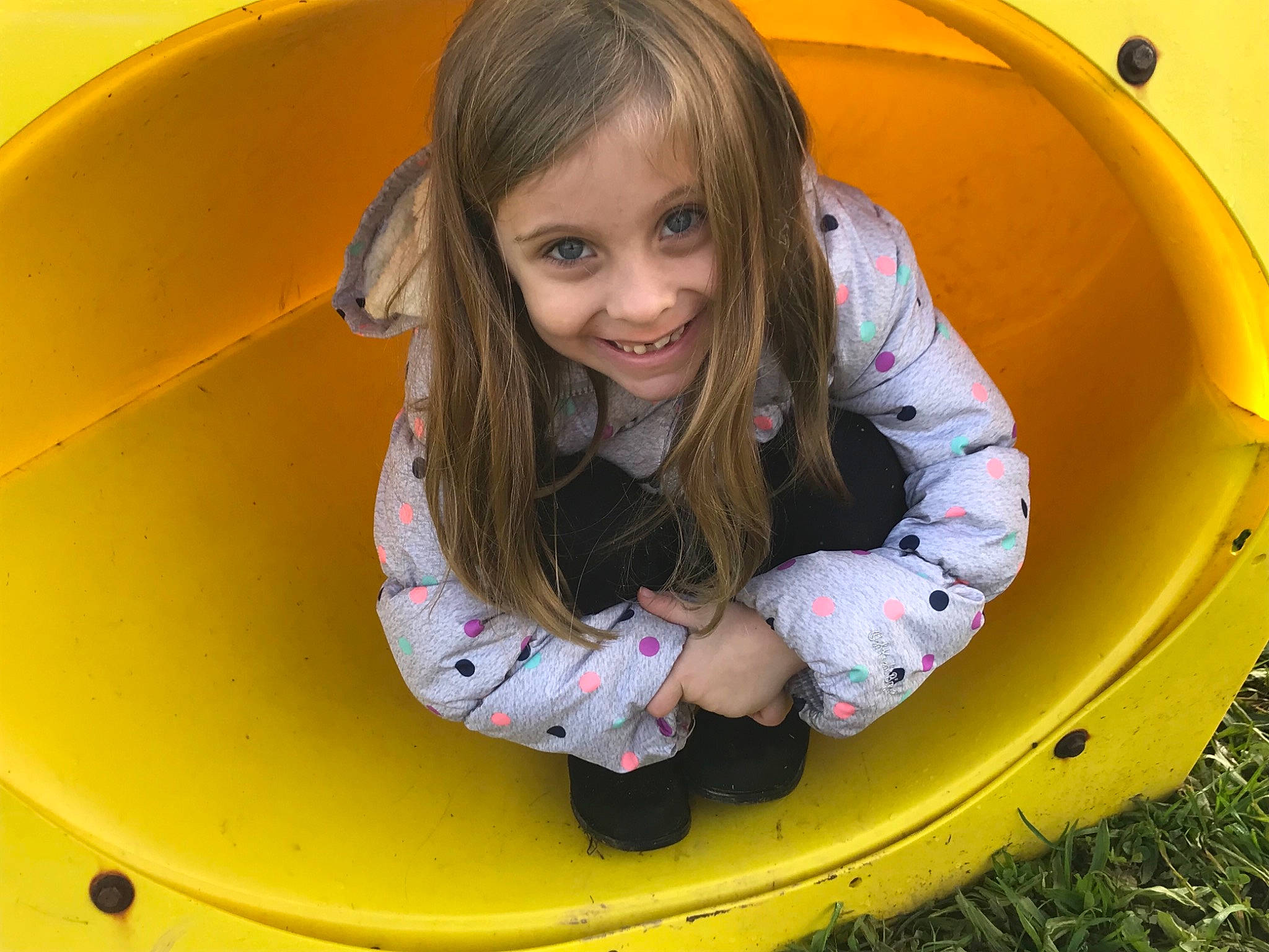 Amaiya joined the competition — help win amazing prizes! child, circle, eye, fun, happy, joy, leisure, outdoor_play_equipment, person, pink, play, playground, public_space, recreation, sitting, smile, toddler, yellow