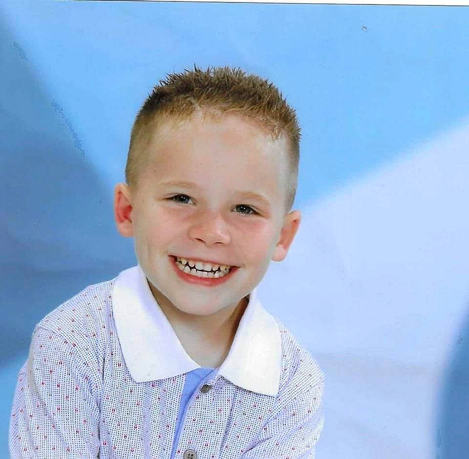 Nolan participe au concours pour gagner de l'argent avec cette photo : brown_hair, caesar_cut, cheek, child, crew_cut, dress_shirt, electric_blue, flash_photography, fun, happy, jaw, joy, laugh, neck, person, portrait_photography, shoulder, sky, sleeve, smile